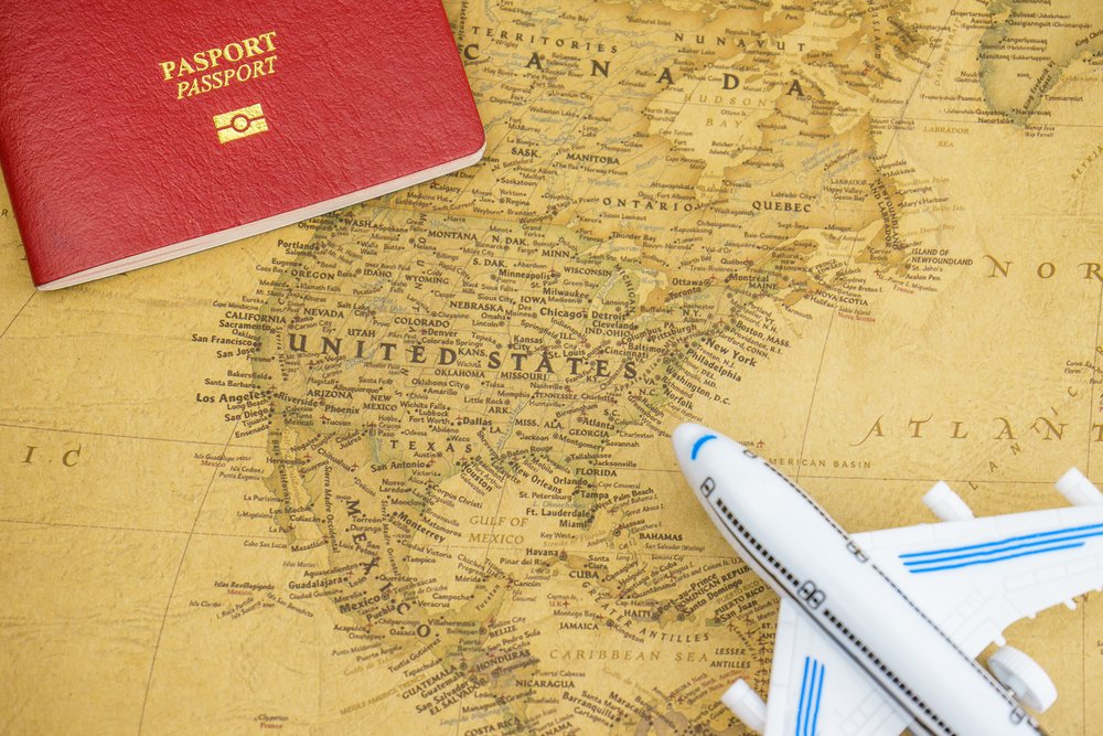 Close,Up,On,United,States,Map,With,Passport,And,Toy